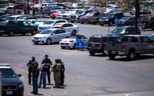 FILE: Law enforcement agencies respond to a shooting at a Walmart near Cielo Vista Mall in El Paso, Texas, on 3 August 2019. Picture: AFP. 