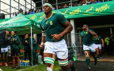 Flanker Phendulani Buthelezi leads out the Junior Springboks ahead of a match. Picture: @JuniorBoks/Twitter