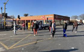 A small group of protestors demonstrated in the Roodepoort CBD over social housing on 11 August 2022. Picture: Nkosikhona Duma/Eyewitness News