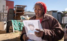 Matsietsi Ralilateng looks at a picture of her grandson Katlego Bereng Mpholo, whose body was found inside Thabo Bester's prison following his escape from the Mangaung Correctional Centre in May 2022. Picture: Jacques Nelles/Eyewitness News