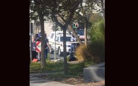 The scene outside Standard Bank in Rosebank, Johannesburg, where a man has been shot dead in an alleged robbery. Picture: Supplied. 