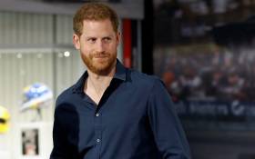 FILE: Britain's Prince Harry, Duke of Sussex looks at exhibits during a visit to officially open the Silverstone Experience at Silverstone motor racing circuit, in central England on 6 March 2020. Picture: AFP