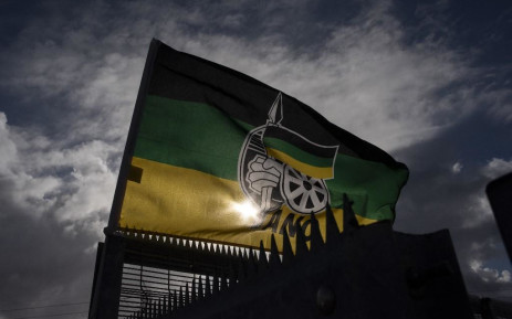 FILE: An ANC flag flies outside a polling station in Langa, near Cape Town. Picture: AFP