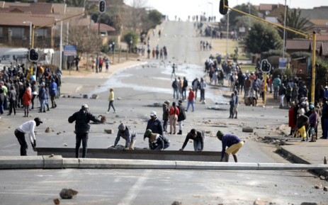 File. Violent demonstrations in Tembisa have claimed the lives of at least four people.  Picture: Guillem Sartorio/AFP
