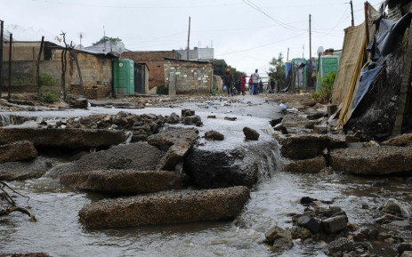 Heavy rains regularly flood the lower-lying areas of Kliptown in the south of Johannesburg (Photographs by Dennis Webster).