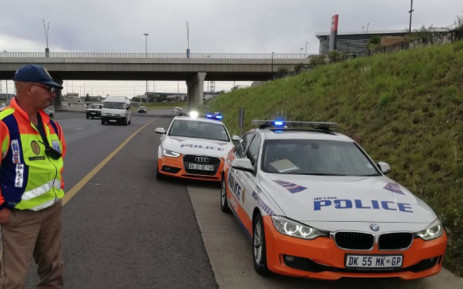 A JMPD officer conducts a roadside check in Johannesburg. Picture: @AsktheChiefJMPD/Twitter.