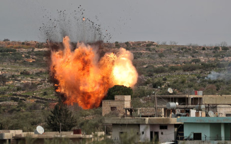 A picture taken on 5 March 2020 shows an explosion following Russian airstrikes on the village of al-Bara in the southern part of Syria's northwestern Idlib province. Picture: AFP