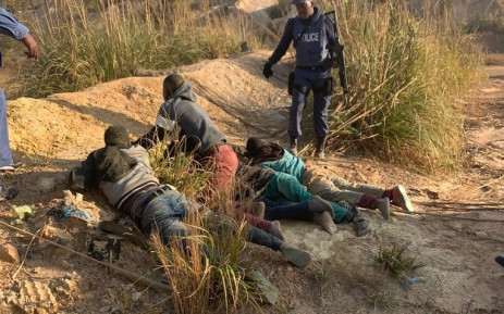 File. The community has been demonstrating against the rise in crime, and illegal mining operations, taking place at several mine dumps in the area. Picture: SAPS