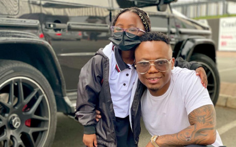 Dj Tira and his daughter on her first day at school. Picture: @DJTira/Twitter