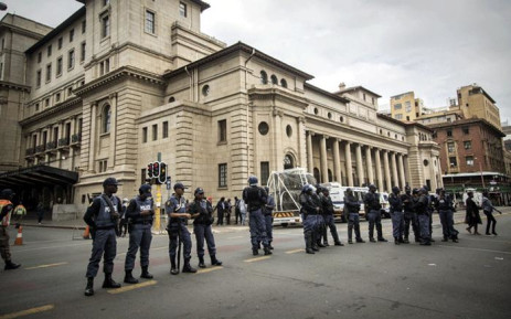 South African Police Services stationed outside the Gauteng Legislature Building in Johannesburg CBD before the State of the Provincial Address on 26 February 2018.  Picture: Sethembiso Zulu/EWN.