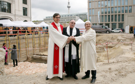 (Left to right) Pastor Gregor Hohberg, Rabbi Andreas Nachama and Imam Kadir Sanci pose during the groundbreaking ceremony of the multi-religion building "House Of One" on 27 May 2021. The "House of One" is planned as a sacral building with a synagogue, church and mosque in Berlin. Picture: Wolfgang Kumm/AFP