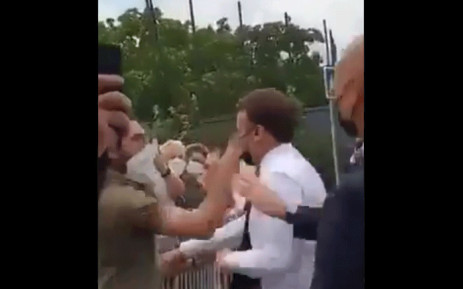 French President Macron slapped during crowd stop