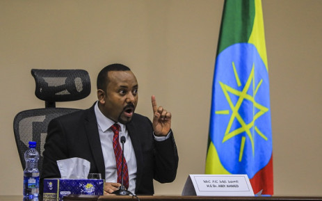 FILE: Ethiopian Prime Minister Abiy Ahmed gestures at the House of Peoples Representatives in Addis Ababa, Ethiopia, on 30 November 2020 to respond to the Parliament on the current conflict between Ethiopian National Defence Forces and the leaders of the TPLF. Picture: AFP. 