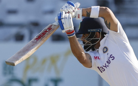 India's Virat Kohli watches the ball after playing a shot during the second day of the third Test cricket match between South Africa and India on 12 January 2022. Picture: Marco Longari/AFP
