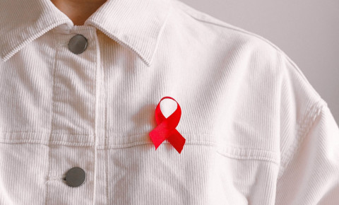 Stock image of a person wearing an Aids awareness ribbon. Picture: Pexels
