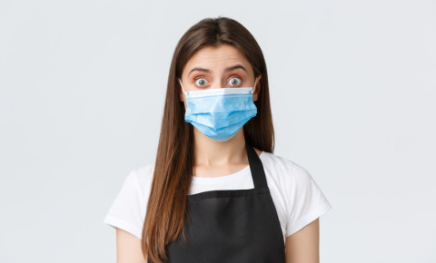 Covid-19 surgical mask shocked surprised woman 123rf