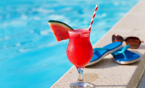 cocktail-sunglasses-slipslops-at-pool-hotel-holidayjpg