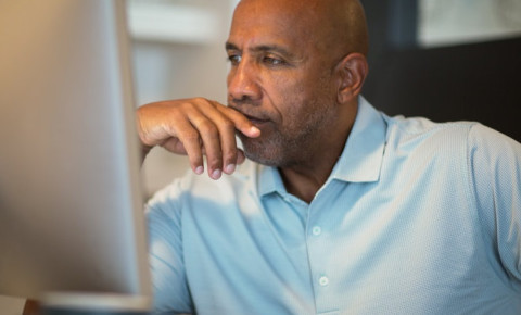 worried-small-business-owner-looking-at-computerjpg