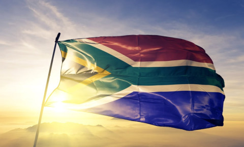 south-african-flag-waving-at-sunrisejpg