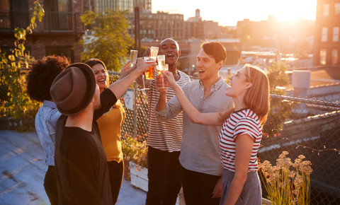 Friends party toast drinking celebrating wine rooftop 123rf