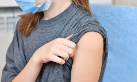 Young girl teen teenager mask vaccinated vaccination vaccine rollout jab 123rf