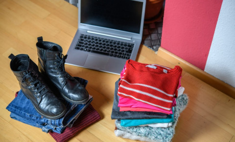 secondhand-clothing-shoes-computer-in-background-online-salesjpg