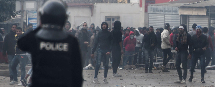 Tunisian protesters clash with security forces in the town of Tebourba on 9 January 2018, following the funeral of a man who was killed the previous day in a demonstration over rising costs and government austerity. Picture: AFP