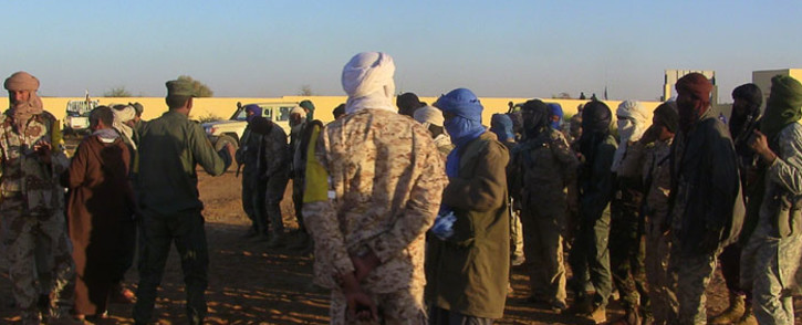 FILE: Former rebels, predominantly Tuareg, waiting in a military camp in Gao, before participating in joint patrols with the Malian army and pro-government militias. Picture: AFP
