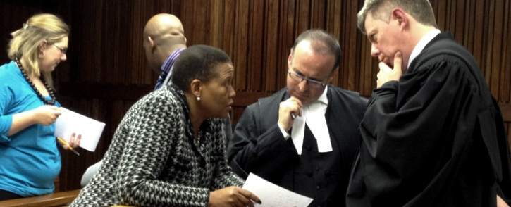FILE: IEC Chair Pansy Tlakula confers with her legal team at the Electoral Court during a hearing into her credibility. Picture: Govan Whittles/EWN.