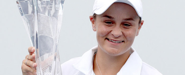 Ashleigh Barty of Australia poses with the winner's trophy after defeating Bianca Andreescu of Canada during the final of the Miami Open at Hard Rock Stadium on 3 April 2021 in Miami Gardens, Florida. Picture: Matthew Stockman/AFP