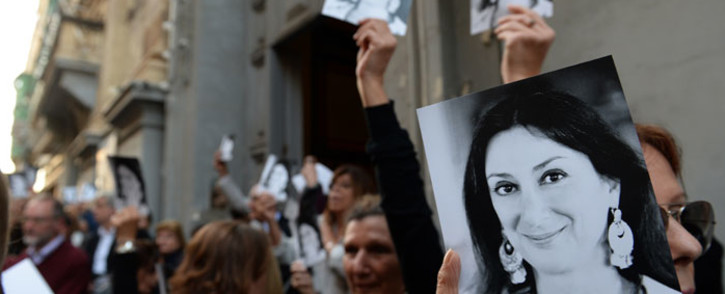 People leave the church of St Francis, after the Archbishop of Malta celebrated mass in memory of murdered journalist Daphne Caruana Galizia on the sixth month anniversary of her death in Valletta, Malta on 16 April 2018. Picture: AFP