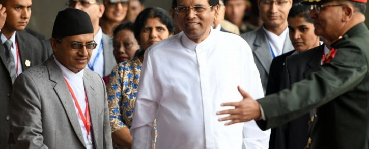 Sri Lankan President Maithripala Sirisena looks on as he arrives at Tribhuvan International Airport to attend the 4th Summit of the Bay of Bengal Initiative for Multi-Sectoral Technical and Economic Cooperation (BIMSTEC) in Kathmandu on 29 August 2018. Picture: AFP
