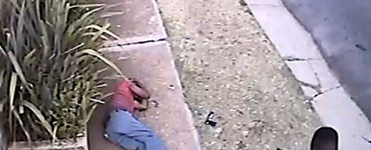 FILE: A screengrab from a video showing a police officer shooting criminal Khulekani Mpanza in Krugersdorp.