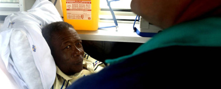 FILE: Former police commissioner Jackie Selebi is seen in the back of an ambulance transporting him to hospital after he collapsed at his Waterkloof home. Picture: SAPA