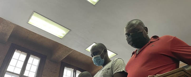 The men who have been dubbed the ‘Rosettenville 10’ walked into a heavily guarded court room with countless officers and members of the Crime Intelligence Unit armed with rifles. Picture: Kgomotso Modise/Eyewitness News