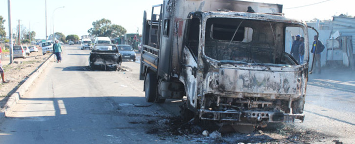 A City of Cape Town maintenance truck was hijacked and torched in Delft on 3 June 2021. Picture: Nqobile Simelane, COCT