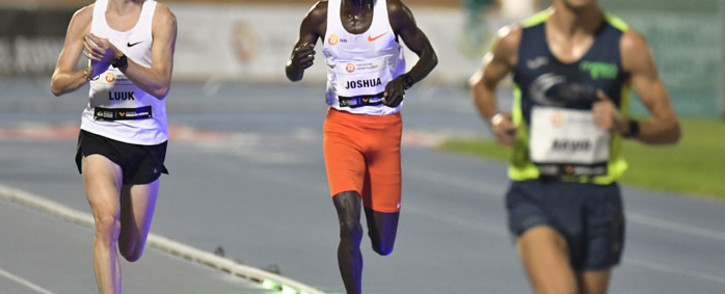 Ugandan athlete Joshua Cheptegei (C) competes in the men's 10,000m event during the NN Valencia World Record Day at the Turia stadium in Valencia on 7 October 2020. Cheptegei set a new men's 10,000m world record of 26 minutes 11 seconds in event. Picture: AFP