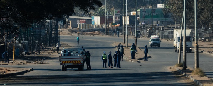 FILE: Eyewitnesses say police were checking vehicles for weapons on most major roads leading into the city. Picture: AFP