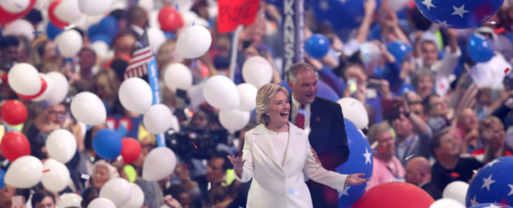 Democratic presidential candidate Hillary Clinton and US Vice President nominee Tim Kaine acknowledge the crowd at the end on the fourth day of the Democratic National Convention at the Wells Fargo Center, 28 July, 2016 in Philadelphia, Pennsylvania. Picture: AFP.
