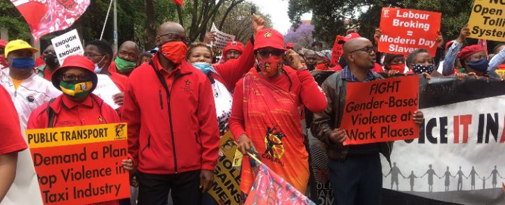 SACP deputy general secretary Solly Mapaila and Cosatu president Zingiswa Losi lead striking workers in Pretoria on 7 October 2020. Picture: Theto Mahlakoana/EWN