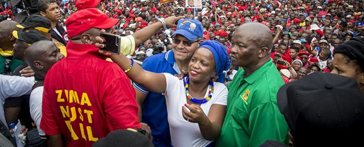 Members of the DA John Moodey (left) and Phumzile van Damme (centre) pose for a selfie with the UDM's Bantu Holomisa at the 'Day of Action' march against the leadership of President Jacob Zuma in Pretoria on 12 April 2017. Picture: Reinart Toerien/EWN