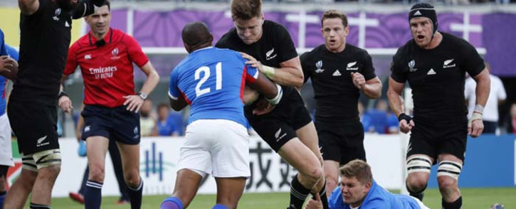 New Zealand's fly-half Jordie Barrett (C) scores a try during the Japan 2019 Rugby World Cup Pool B match between New Zealand and Namibia at the Tokyo Stadium in Tokyo on 6 October 2019.Picture: AFP