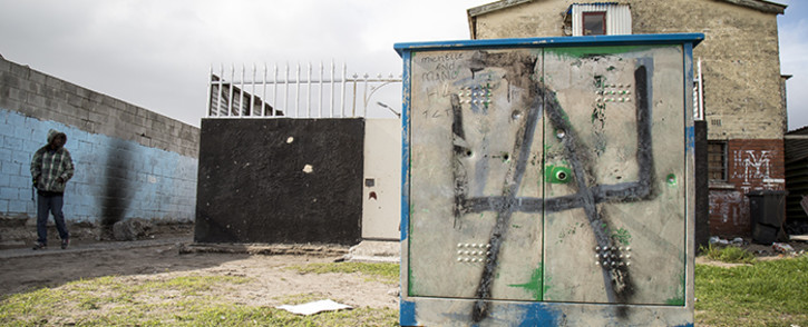FILE: A graffiti shows UA, for Ugly Americans, a gang in Manenberg. This electricity box lies on a crossroads, a battle zone, were the Ugly Americans fight the Hard Livings. Picture: Thomas Holder/EWN.