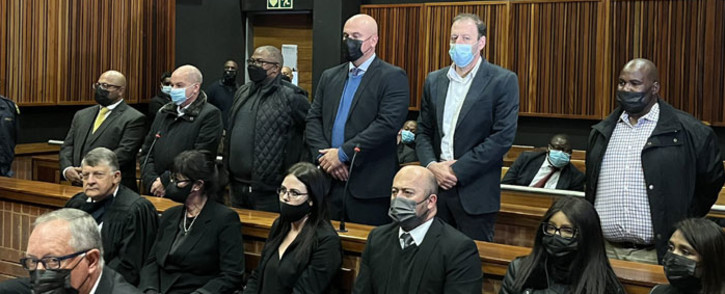 Former Transnet Group CEO, Siyabonga Gama (third from left), and his co-accused appear in the Palm Ridge Magistrates Court on 27 May 2022 following their arrest on the same day. Picture: Nkosikhona Duma/Eyewitness News
