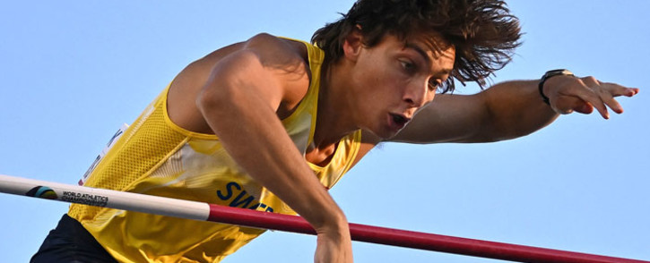 Sweden's Armand Duplantis sets a world record as he competes in the men's pole vault final during the World Athletics Championships at Hayward Field in Eugene, Oregon on 24 July 2022. Picture: Ben Stansall / AFP