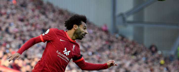 Liverpool midfielder Mohamed Salah heads the ball during the English Premier League football match between Liverpool and Manchester City at Anfield on 3 October 2021. Picture: AFP