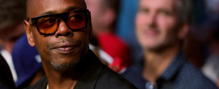 In this file photo taken on 10 July 2021 Dave Chappelle looks on during UFC 264: Poirier v McGregor 3 at T-Mobile Arena in Las Vegas, Nevada. Picture: Stacy Revere/AFP