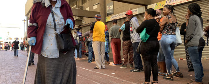 Pensioner Anne Snyman leaves Mitchells Plain's Town Centre after collecting her pension payout on 30 March 2020. She said she stood in line for six hours. Picture: Kaylynn Palm/EWN