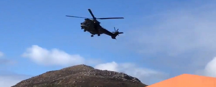 An SANDF helicopter carrying police officers was dispatched to Ocean View to assist with the violence that escalated between police and protesters on 8 August 2019. Picture: Kevin Brandt/EWN.