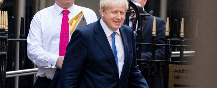 FILE: New Conservative Party leader and Prime Minister Boris Johnson leaves the Conservative party headquarters in central London on 23 July, 2019. Picture: AFP.